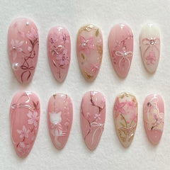 KRTBKR pink flower press-on nails in medium almond shape for quick manicure