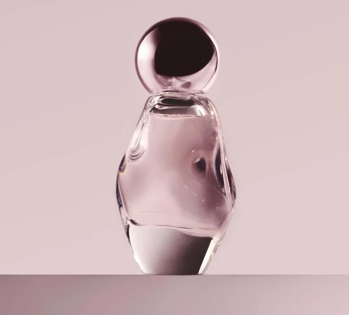 Kylie Cosmetics Cosmic Eau de Parfum bottle close-up highlighting amber floral notes