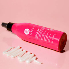 Luseta Keratin Leave-In Conditioner application close-up showing smoothing effect