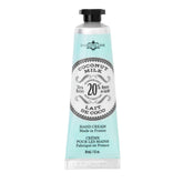 La Chatelaine travel-size hand cream in coconut milk tube for on-the-go hydration.