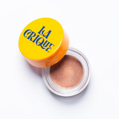 La Crique 04 Copper cream eyeshadow highlighter jar close-up showing luminous, buildable glow
