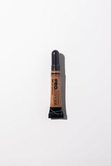 Under-eye area covered with discreet, natural-looking concealment.