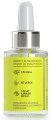 Dropper application of La Pocion B8 hair oil for precise frizz control
