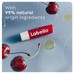 Labello Cherry lip balm texture shows cherry shimmer for daily gloss.