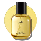 LA'DOR hair perfume oil bottle close-up showing nourishing shine and frizz control