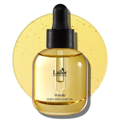 LA'DOR Hair Perfume Oil bottle shown with Hinoki notes for radiant shine.