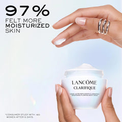 Lancôme Clarifique Milky Cream spread on hand, showcasing silky texture for smooth skin.