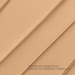 Lancôme Teint Idole Ultra Wear Foundation Stick built-in kabuki brush in use.