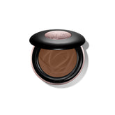 Lancôme Teint Idole Ultra Wear powder compact close-up showing the soft matte finish and pore-blurring effect.