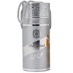 Lattafa Oud Mood Reminiscence heart notes with amber and bay leaves for refinement