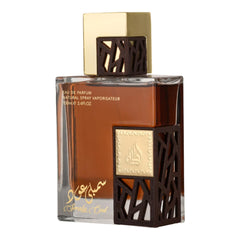 Lattafa Simply Oud bottle side view, highlighting its woody profile for formal events.