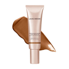 Laura Mercier Tinted Moisturizer Light Revealer bottle closeup with SPF 25 protection.