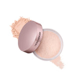 Laura Mercier translucent loose powder compact demonstrates easy daily setting for long-lasting makeup
