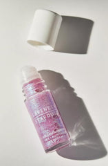 Lavender Stardust roll-on shimmer on the body adds subtle sparkle for festive looks.