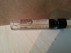 Le Labo Santal 33 bottle close-up highlighting premium design and fragrance vibe.