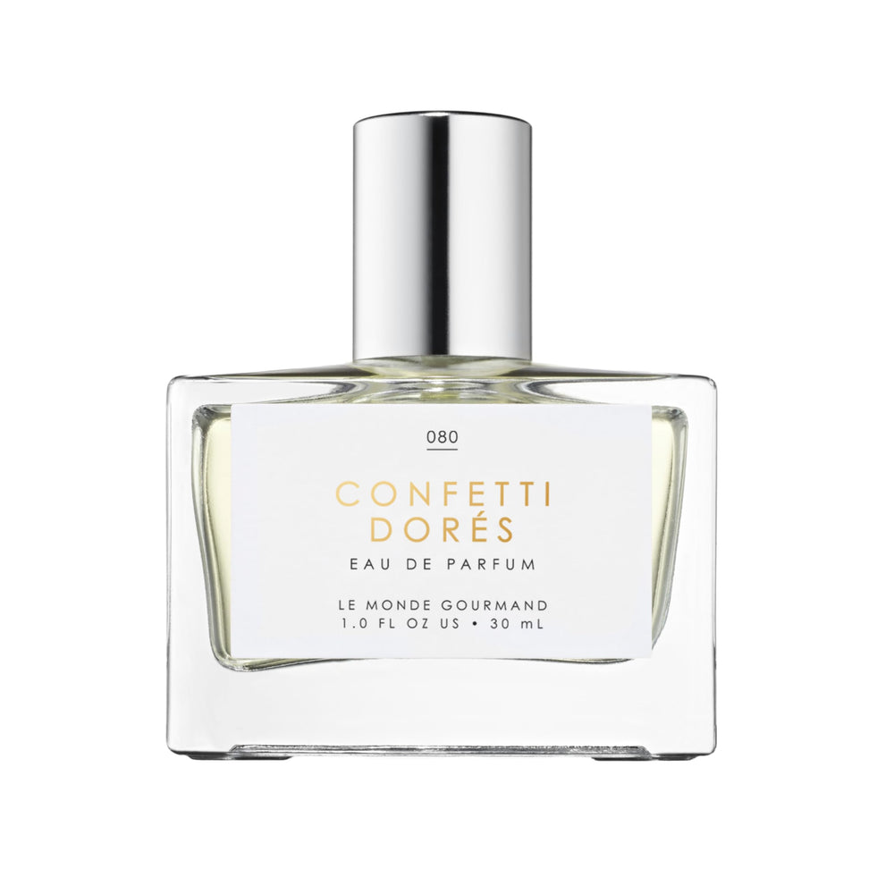 Le Monde Gourmand Confetti Dorés spray bottle—premium fragrance for celebrations