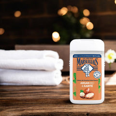 Le Petit Marseillais Argan BIO Body Wash closeup texture highlights creamy emulsion for softness.