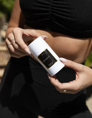 Les Deux natural deodorant stick application gesture shows easy, smooth glide for unisex use