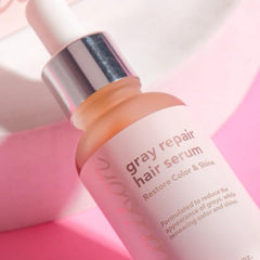 Liaison Gray Repair Serum on silky hair with vibrant shine