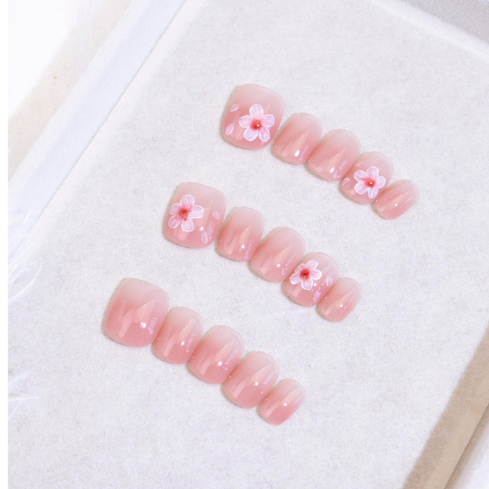 Light Rain medium-size press-on nails in a studio shot with a salon-quality finish.