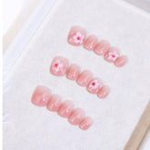 Light Rain medium-size press-on nails in a studio shot with a salon-quality finish.