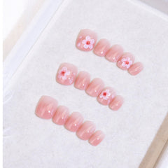 Light Rain medium-size press-on nails in a studio shot with a salon-quality finish.