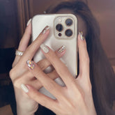 Light Rain press-on nails design close-up showing hand-painted 3D artwork you can wear at home.
