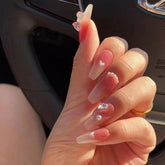 Light Rain small-size nails with a unique hand-painted design for a chic look.