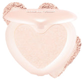 Lilybyred Luv Beam Glow Veil heart-shaped highlight on cheeks for radiant definition.
