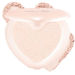 Lilybyred Luv Beam Glow Veil heart-shaped highlight on cheeks for radiant definition.