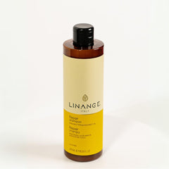 LINANGE Repair Shampoo close-up highlights nourishing action for treated hair.