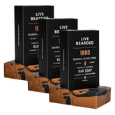 Live Bearded 1880 bar soap close-up showing charcoal-pumice lather