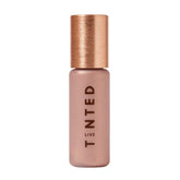 Live Tinted Hueglow drops bottle pour enhances luminous skin with lightweight hydration.