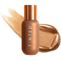 Live Tinted Hueglow bottle on skin shows dewy radiance