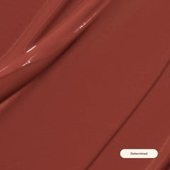Live Tinted Huelip applicator close-up for precise, weightless matte application.