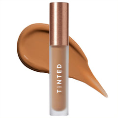 Live Tinted Hueskin Serum Concealer application demonstrates smooth blending for natural finish