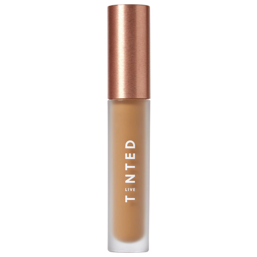 Live Tinted Hueskin Serum Concealer packaging close-up showing shade 9 and premium design.