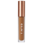 Live Tinted Hueskin Serum Concealer packaging close-up showing premium design and shade readiness.