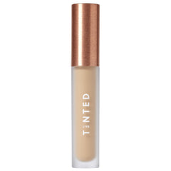 Live Tinted Hueskin Serum Concealer packaging for easy, on-the-go application.