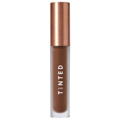 Live Tinted Hueskin Serum Concealer packshot shows buildable coverage.