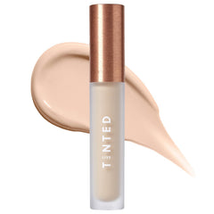 Hueskin Serum Concealer tube ready for precise application
