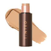 Live Tinted HUESTICK complexion stick offers buildable coverage for a natural look.