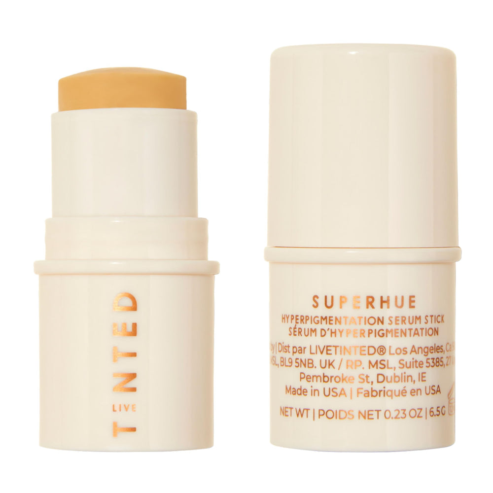 Live Tinted Superhue serum stick on the face for even tone and targeted care.