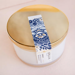 LOLLIA Dream Bath Salt being poured into a warm tub for a fragrant soak