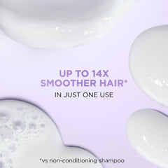 Applying the glossing glaze through damp hair for even distribution.