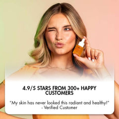 LOUMI RoseGlow Face Oil in hand for a moisture boost.