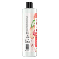 Creamy lather from Love Beauty and Planet white peach and aloe vera body wash close-up.