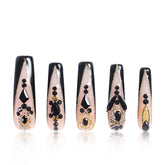 LOVFUL Obsidian Palace nails with black French tip and crystal accents for chic wear