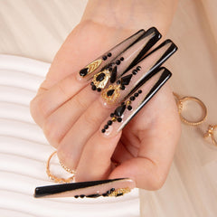 Lovful Obsidian Palace nails featuring crystal embellishments for long-lasting, reusable wear.