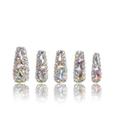 LOVFUL press-on nails with rhinestones on a hand, offering an elegant, quick at-home manicure.